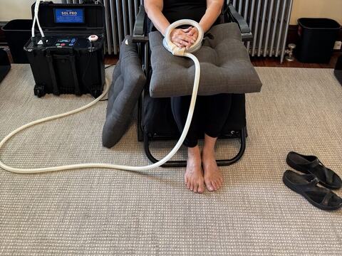 A patient in the PEMF therapy chair