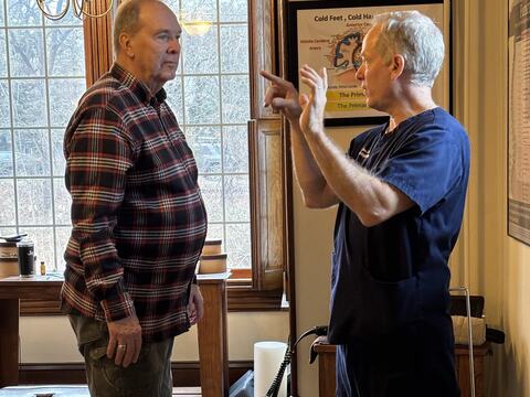 Dr. Schaffer carrying out a neurological exam